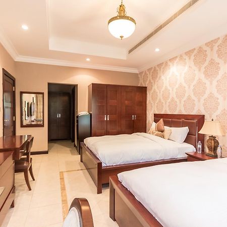 Yanjoon Holiday Homes - Palm Jumeirah Frond A Villas Dubai Bagian luar foto